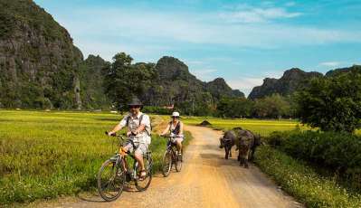 Explorer Ninh Binh à vélo : Itinéraires incontournables et conseils pratiques